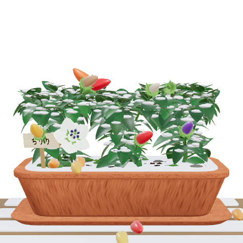 The planter with snow on its leaves and soil
